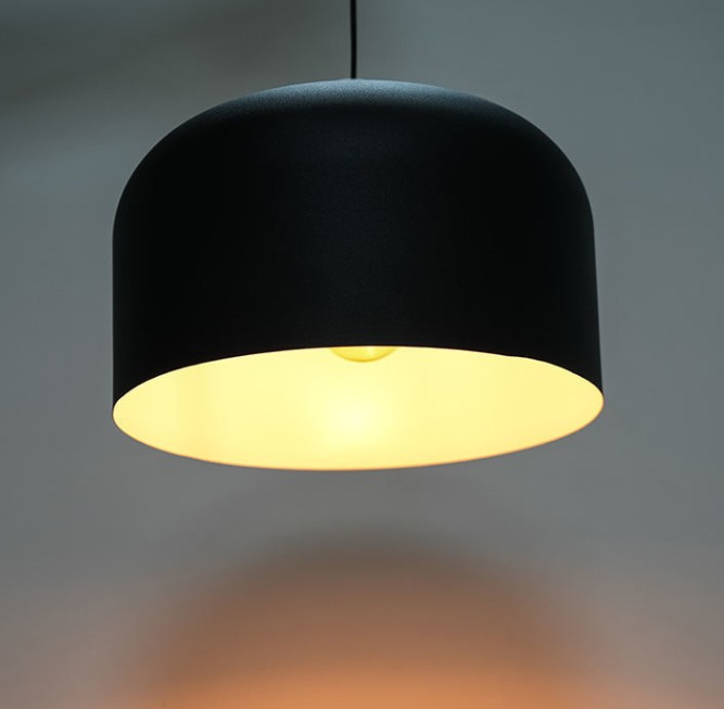How does the black metal body of the Vintage Black Metal Dome Chandelier ensure its stability and service life?
