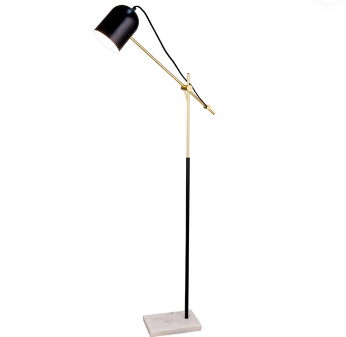 How is the metal adjustable arm of this Metal Adjustable Arm Marble Base Floor Lamp adjusted?